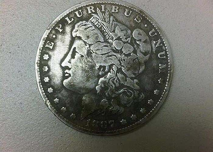 found-an-1887-morgan-silver-dollar-with-v3i-3