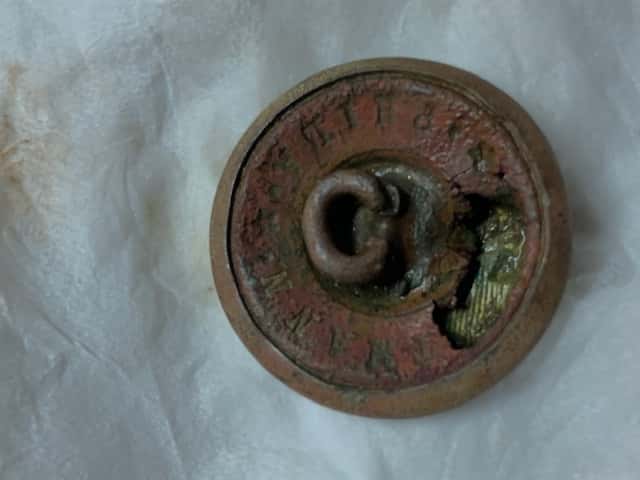 Back of Rusted Button with Bent Shank