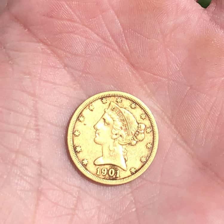 Obverse of 1901 Liberty Head Gold Coin Held In Palm