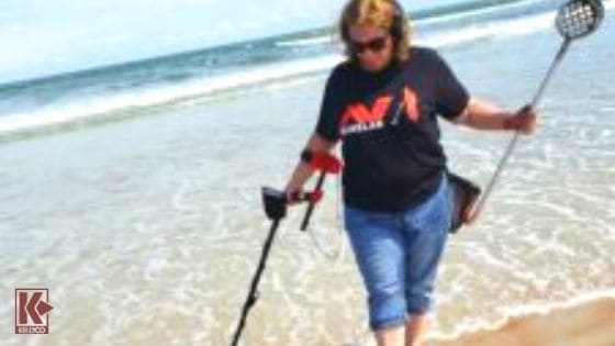 Kellyco Employee Carolyn Harwick Metal Detects On The Beach