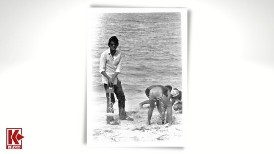Metal detecting on the beach in the mid-20th century