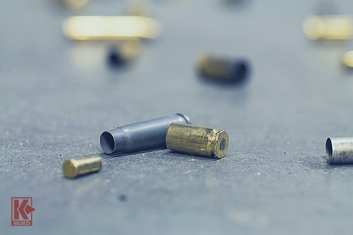 Spent shell casings on cement background